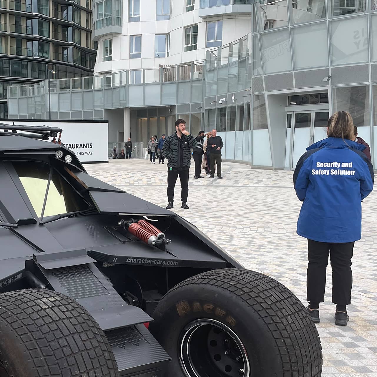 Bodyguard Companies Manage H&S of Close Protection Services Security operator protecting the Batmobile