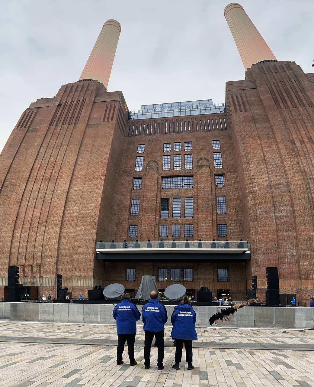 Event Security London Battersea Power Station Security hire for events stood outside of Battersea Power Station